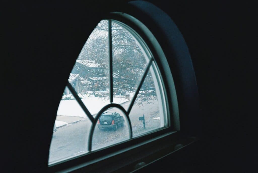custom window over door facing street in winter